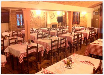 Restaurant La Serra Interior de mesas